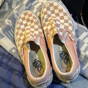 Cute tan and white checkered Vans. Not quite new but in great condition.
